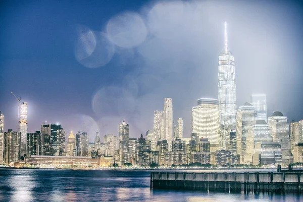 Downtown Manhattan night skyline from Jersey City, New York.