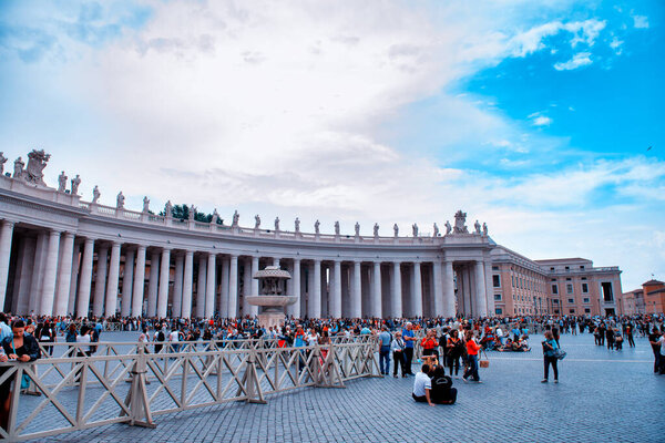 ROME, ITALY - JUNE 2014: Crowded Square in Vatican City. Tourists and locals wait for the Pope to speak on sunday.