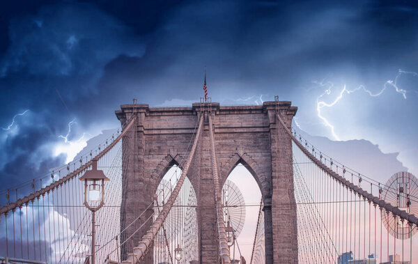 The Brooklyn Bridge under a coming storm, New York City.