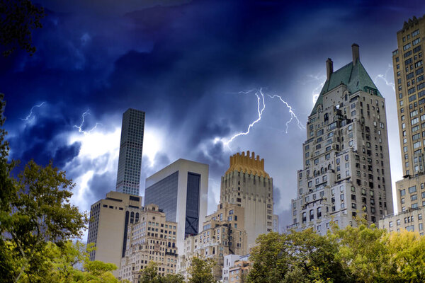 Midtown Manhattan skyscrapers under a coming storm, view form Central Park, New York, USA.
