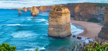 12 Havarinin inanılmaz kıyı şeridi şafak vakti Avustralya 'nın Victoria kentindeki Büyük Okyanus Yolu kıyısındaki Port Campbell Ulusal Parkı' nda kireçtaşı yığınları koleksiyonu..