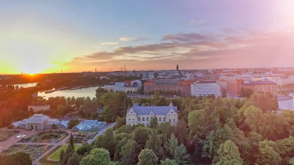 Aerial sunset view of Helsinki skyline from drone, Finland.