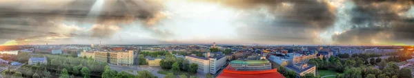 Panoramic sunset aerial view of Helsinki skyline from Uspenski Cathedral, Finland.