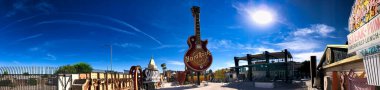 LAS VEGAS - JUNE 27, 2019: The Neon Museum, collection of neon old signs on a beautiful sunny day. Panoramic view.