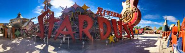 LAS VEGAS - JUNE 27, 2019: The Neon Museum, collection of neon old signs on a beautiful sunny day. Panoramic view.