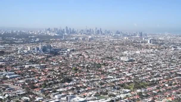 Aerial view of Merbourne skyline from helicopter in slow motion, Australia. City panorama on a sunny day — Stock Video