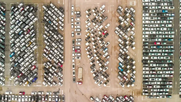 Aerial overhead view of Cars For Sale Stock Lot Row. Car Dealer Inventory