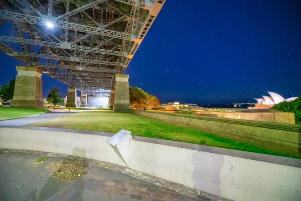 Sydney Harbour Bridge at night, view from the street