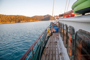 Wooden boat navigating in the Whitsundays, Australia