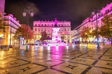 LISBON, PORTUGAL - OCTOBER 30, 2018: City Square with tourists at night