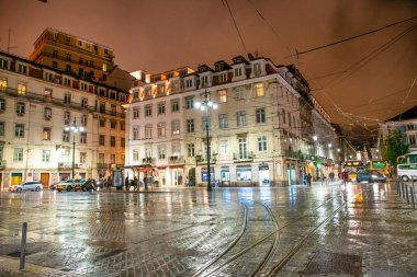 LISBON, PORTUGAL - OCTOBER 30, 2018: City street with tourists at night