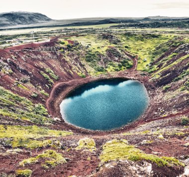 Kerid Crater Lake in Iceland. clipart