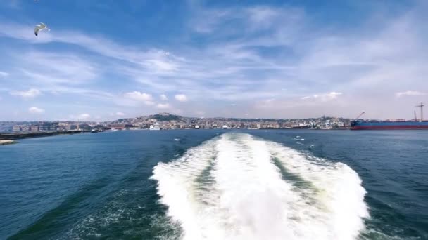 Naples coastline and cityscape from a moving boat in the sea in summer season — Stock Video