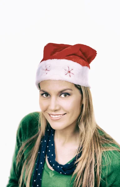 白地に赤のクリスマス帽子と幸せな笑顔の女性 — ストック写真