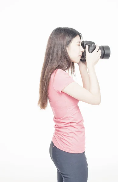 Asian photographer girl making pictures, isolated on white — Stock Photo, Image