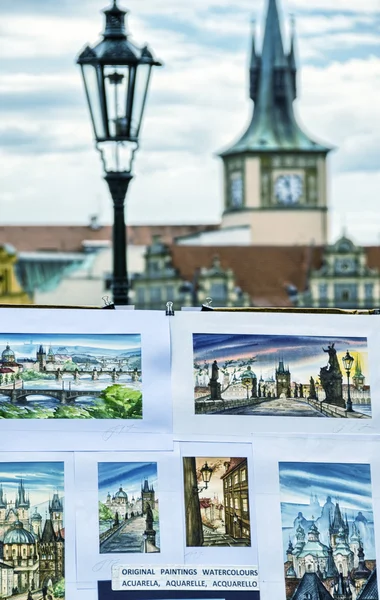 Street artist shows his products — Stock Photo, Image