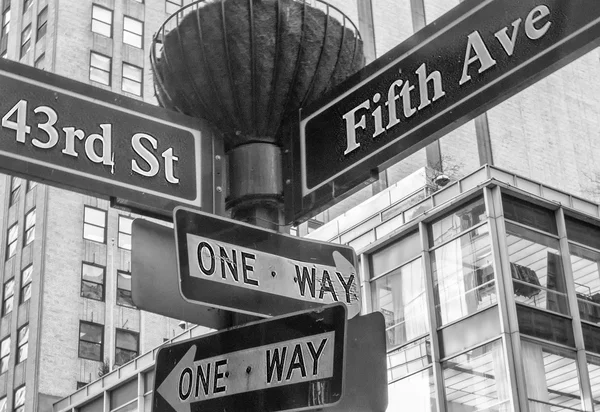 One way and street name sign in Manhattan — Stock Photo, Image