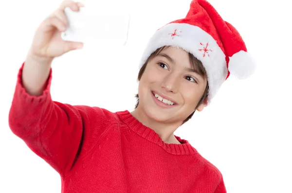 Happy boy wearing Christmas  hat — Stock Photo, Image