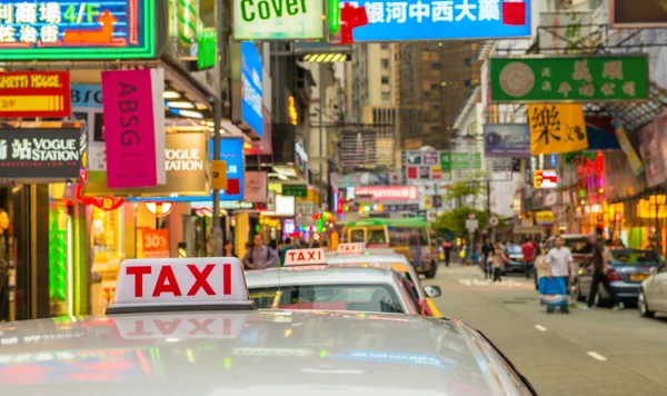 Taxis on city streets in Hong Kong — Stock Photo, Image