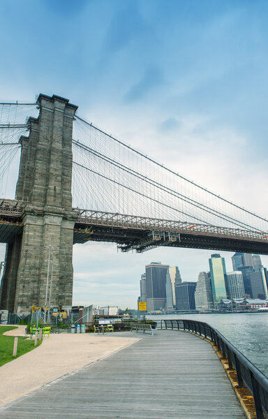 Beautiful view of Brooklyn Bridge and Manhattan skyline from Brooklyn side - New York.