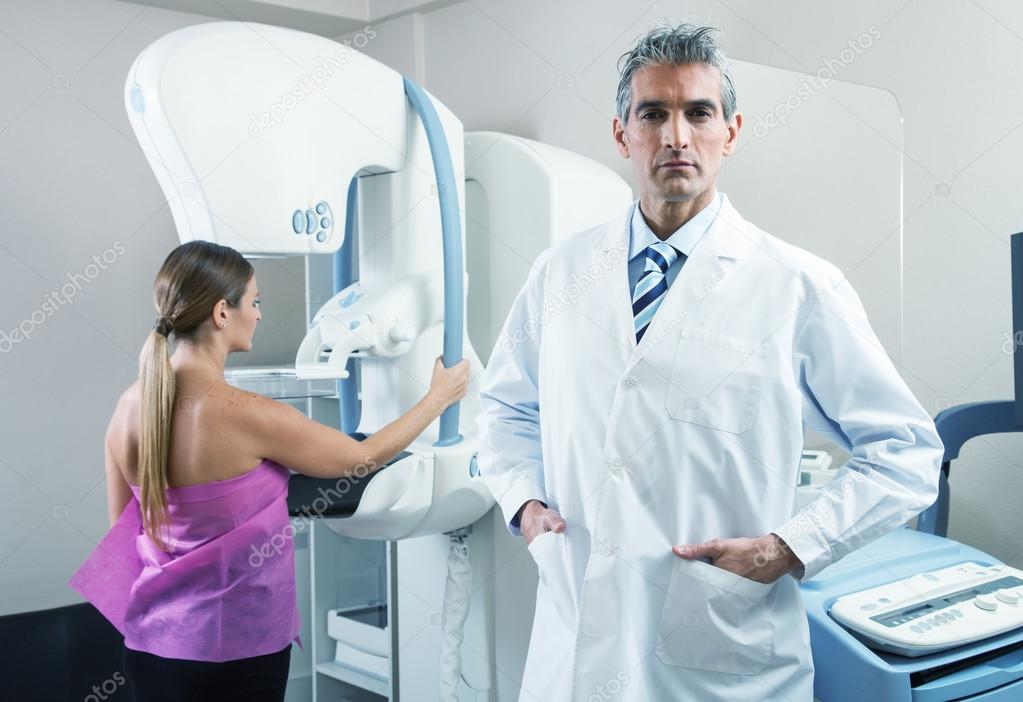 Woman undergoing mammography scan