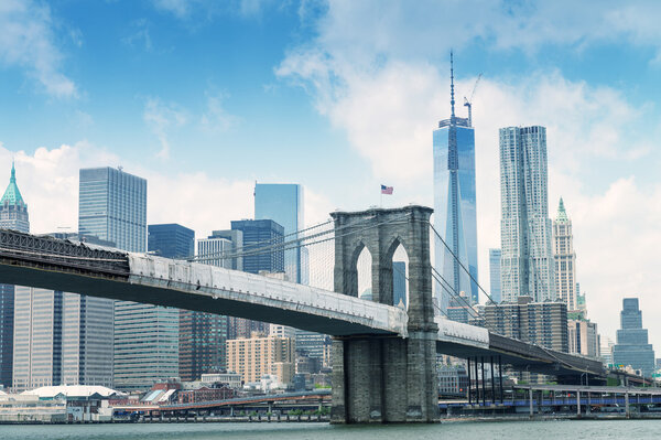 Brooklyn Bridge with Manhattan on background.