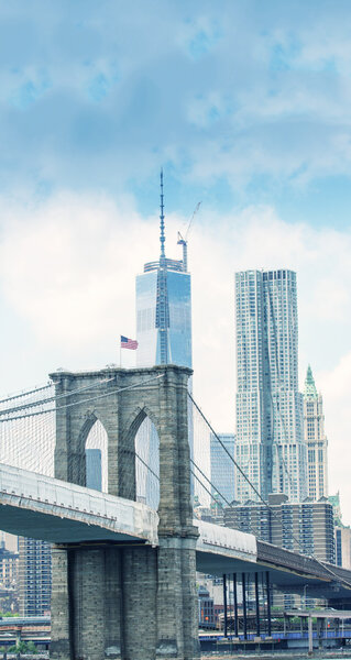 Brooklyn Bridge with Downtown Manhattan skyline.