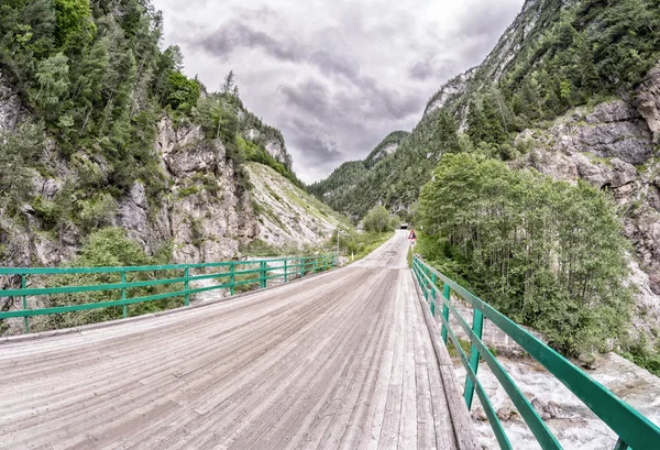 Wooden bridge through the Alps — Stock Photo, Image