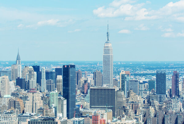 Stunning aerial skyline of Midtown Manhattan on a sunny day, New York City.