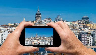 obfemale el ile smartphone tuşları Adaları Int bir resim çekmek