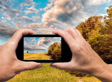 obfemale el ile smartphone tuşları Adaları Int bir resim çekmek