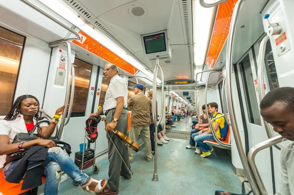 ROME - MAY 20, 2014: Tourists and locals on city subway. The cit — Stock Photo, Image