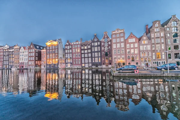 Amsterdam city homes at dusk along canal — Stock Photo, Image