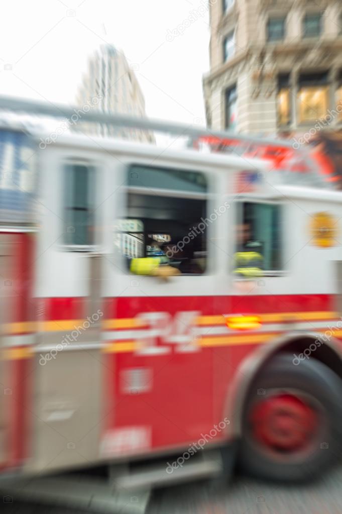 Blurred fast moving firefighters truck in New York City
