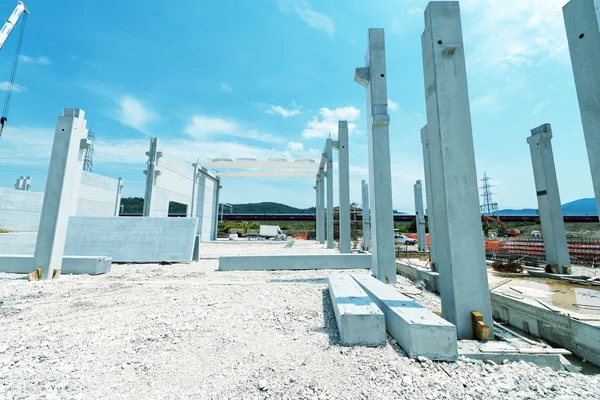 Concrete piles at construction site — Stock Photo, Image