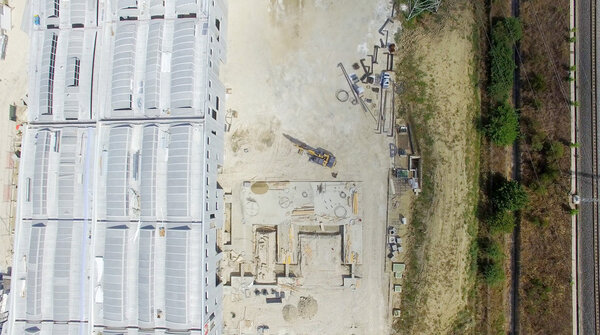 Building construction site, overhead view.