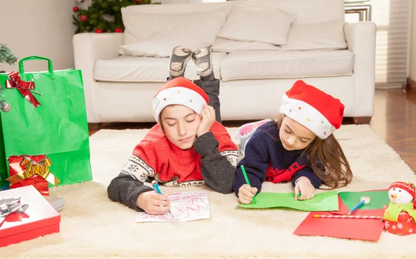 Brother and sister playing on Christmas — Stock Photo, Image