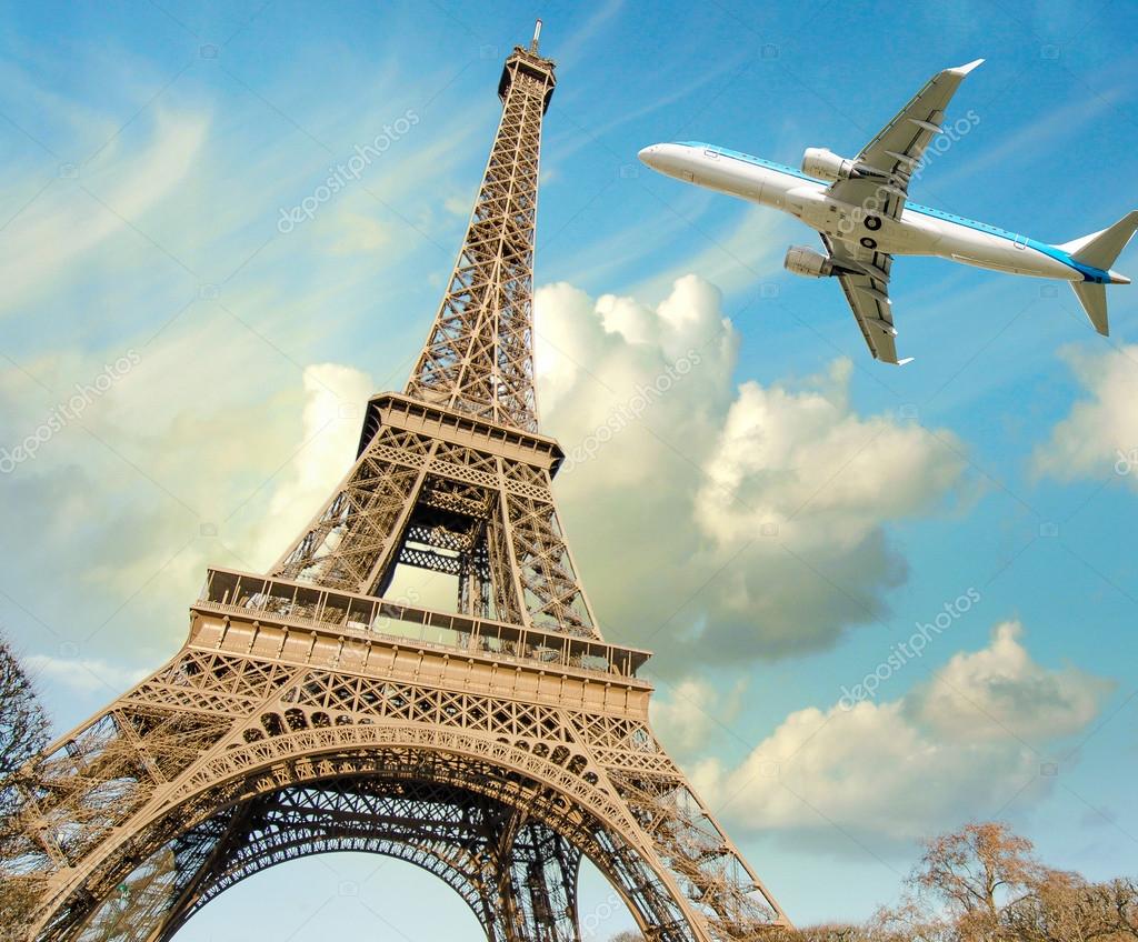 Airplane overflying Eiffel Tower in Paris Stock Photo by ©jovannig 84241250