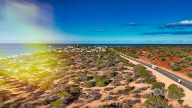 Scenic panorama of Monkey Mia WA captured from drone showing shallow bays and coastal scenery.