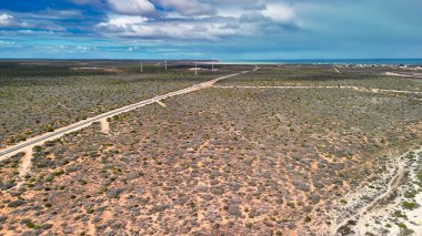Scenic aerial panorama of Little Lagoon Shark Bay WA surrounded by desert and blue coastline.