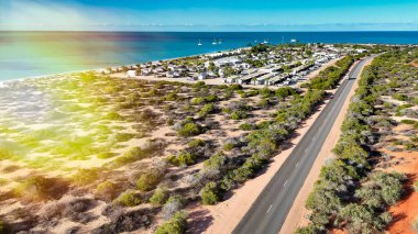 Scenic panorama of Monkey Mia WA captured from drone showing shallow bays and coastal scenery.