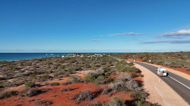 Aerial drone view of Monkey Mia coastline Western Australia with turquoise waters and sandy beaches.