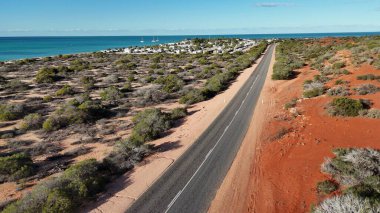 Scenic panorama of Monkey Mia WA captured from drone showing shallow bays and coastal scenery.