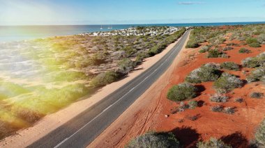 Aerial drone view of Monkey Mia coastline Western Australia with turquoise waters and sandy beaches.