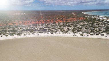 Scenic panorama of Monkey Mia WA captured from drone showing shallow bays and coastal scenery.