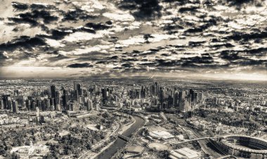 Gün batımında, Melbourne helikopter havadan şehir ve stadyum görünümü.