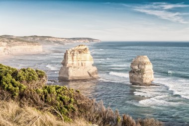 Twelve Apostles rocks in Australia at sunset along Great Ocean Road, Victoria - clipart