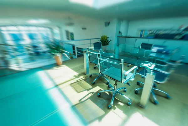 Modern chair inside new office. Business concept. Blurred view — Stock Photo, Image