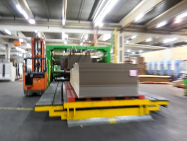 Blurred movement inside paper mill factory — Stock Photo, Image