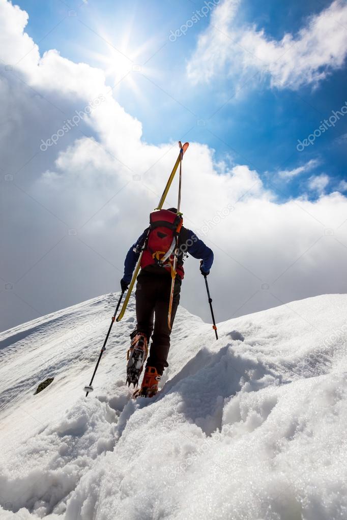 Ski mountaineer walking up